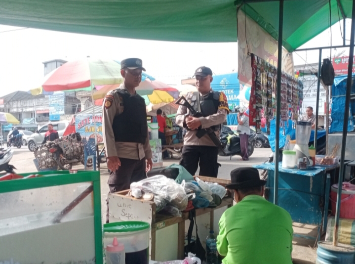 Polsek Ukui Gencarkan Patroli Pasar Tradisional, Wujudkan Rasa Aman Pedagang dan Pembeli
