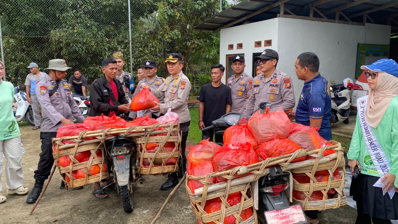 Sambut HUT Bhayangkara ke-80, Polda Riau Salurkan Bantuan Sosial dan Layanan Kesehatan di Danau Sentul