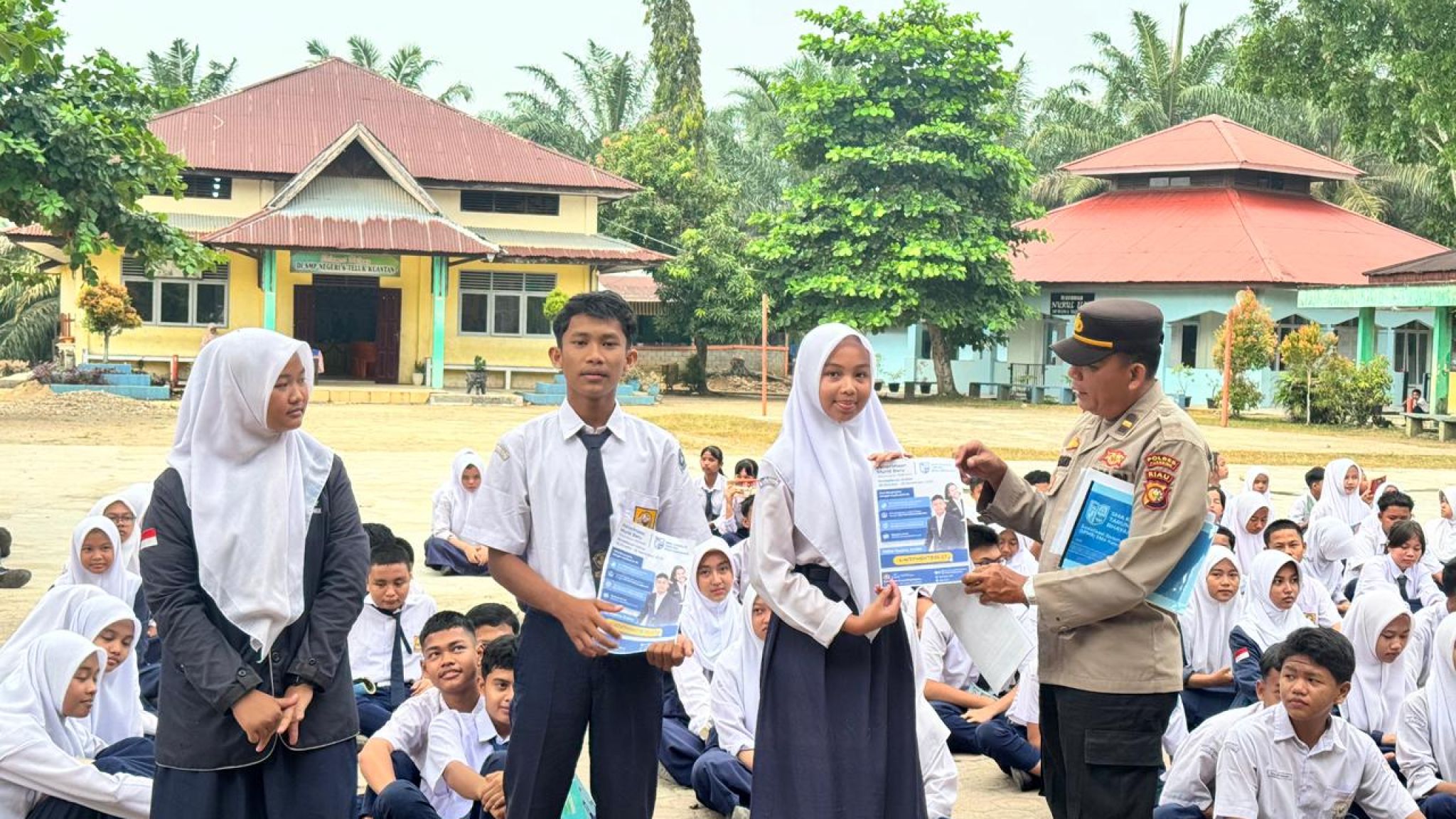 Polres Kuansing Gelar Sosialisasi PPDB SMA Kemala Taruna Bhayangkara di SMPN 6 Teluk Kuantan